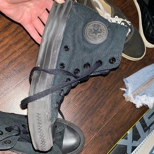 All black high top converse